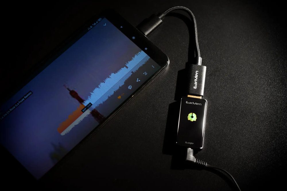 EarMen Eagle DAC and amp plugged into phone