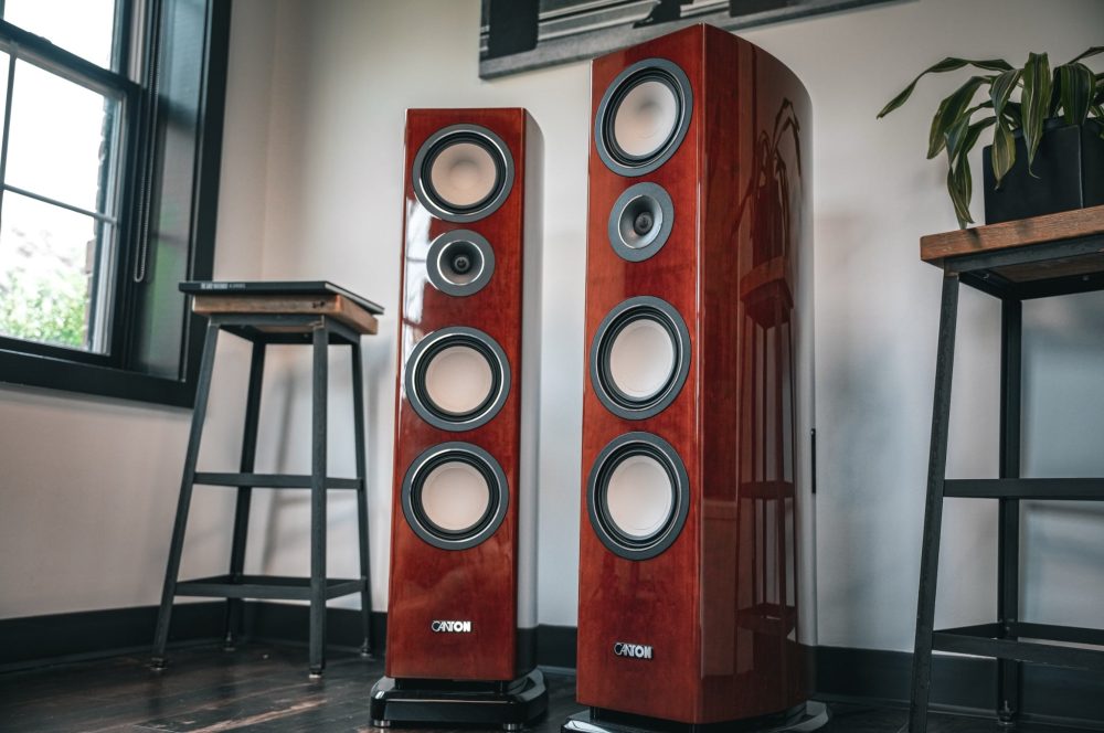 Canton Reference 7K cherry finish with modern industrial stools in living space