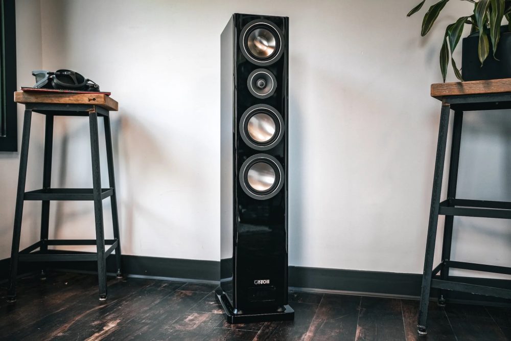 Canton Smart Townus 8 black with modern industrial stools from Bloom Audio gallery