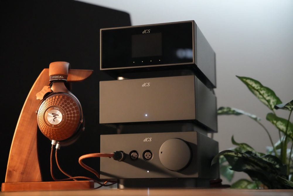 dCS Lina full system with Focal Stellia headphone on wooden stand from Bloom Audio gallery