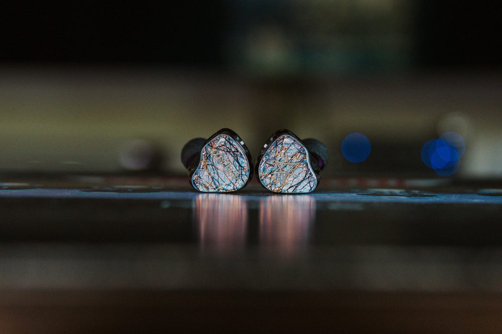 Flipears aether iem close up sitting on wooden table