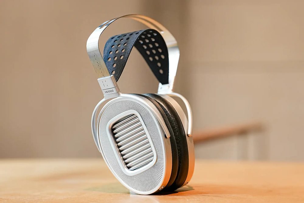 HIFIMAN HE1000 headphone sitting on wooden table