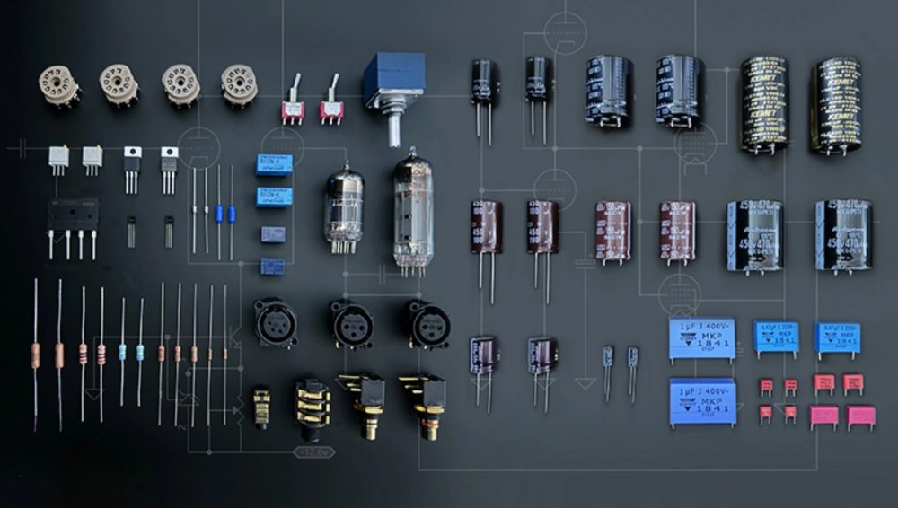 HiFiMAN tubes, transistors and circuit components meticulously aligned over GA-10 amp schematic