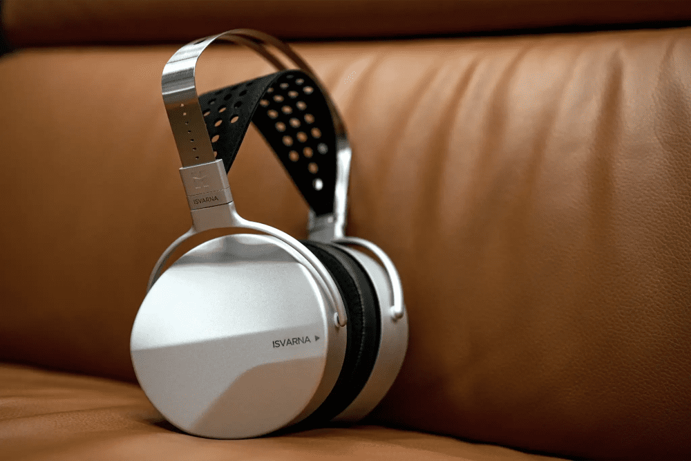 HiFiMAN ISVARNA headphone sitting on leather couch