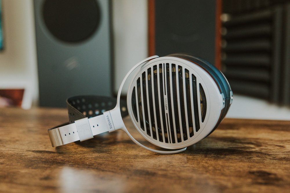 Hifiman Susvara profile view sitting on wooden table