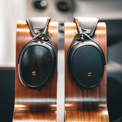 Meze Liric and Liric 2 side by side profiles on headphone stands