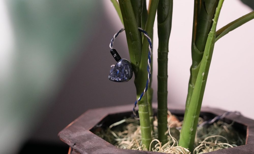 Noble Audio Ronin hanging on Japanese plant