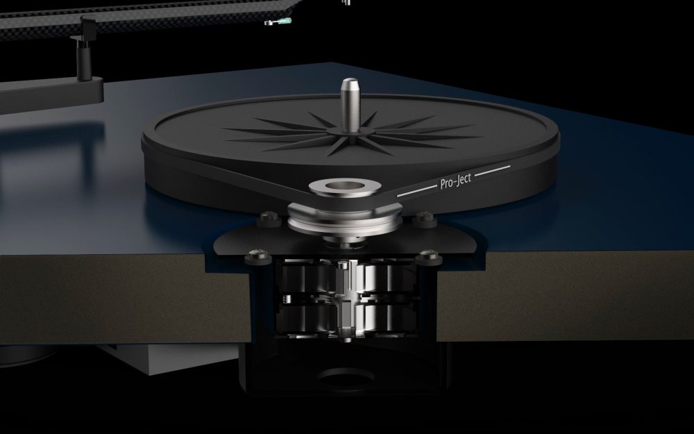 Pro-Ject Debut Carbon EVO motor cutaway highlighting steel and decoupling