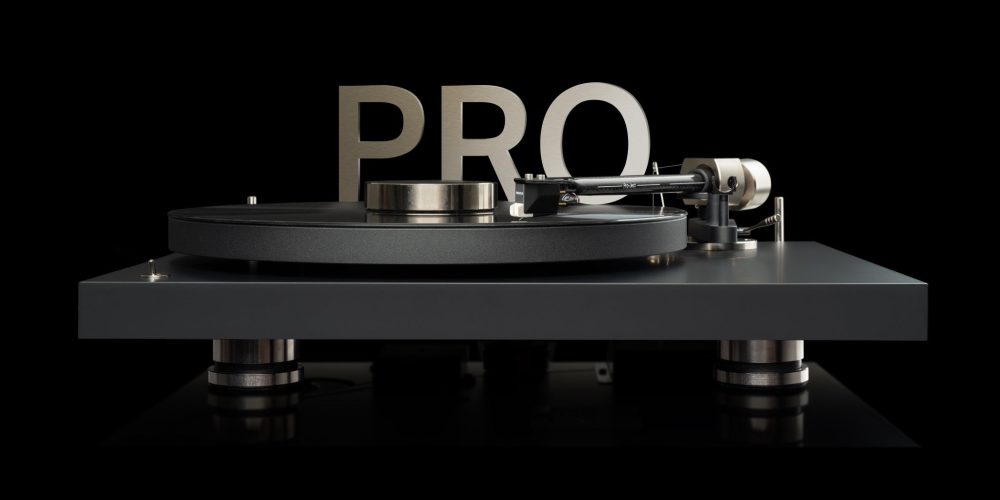 Pro-Ject Debut Pro front eye level with PRO logo over black background