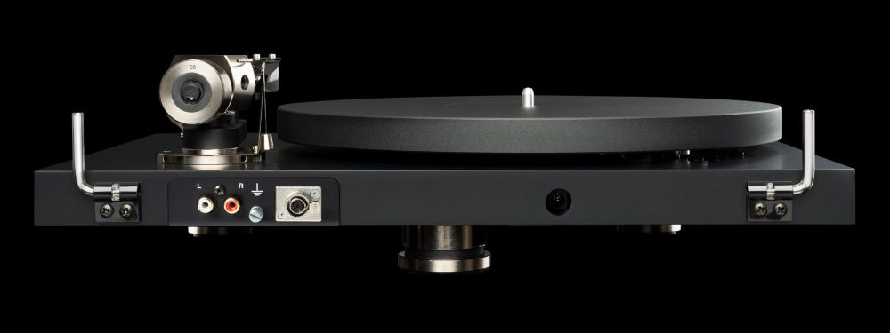 Pro-Ject Debut Pro B rear eye level highlighting RCA and XLR outputs over black background