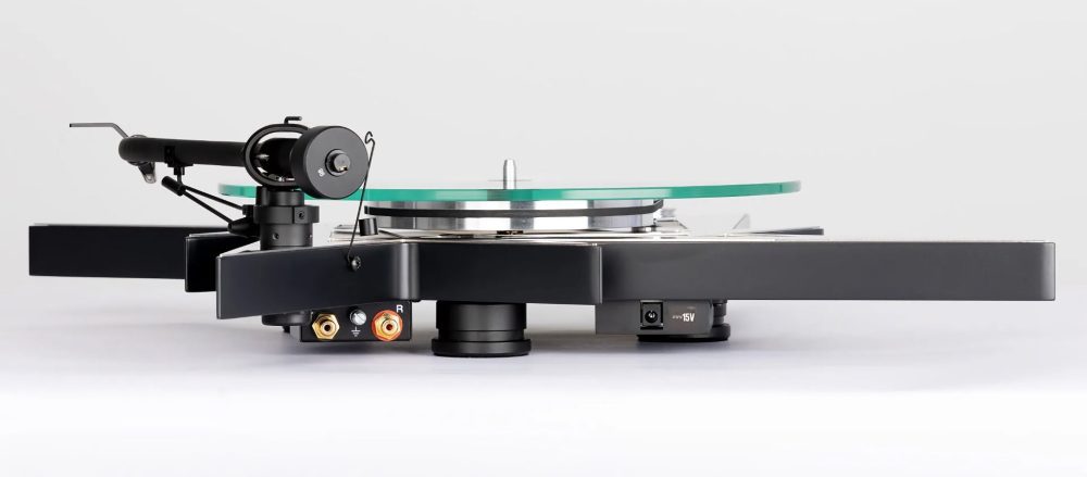 Pro-Ject Metallica turntable rear profile highlighting adjustable feet and connectors