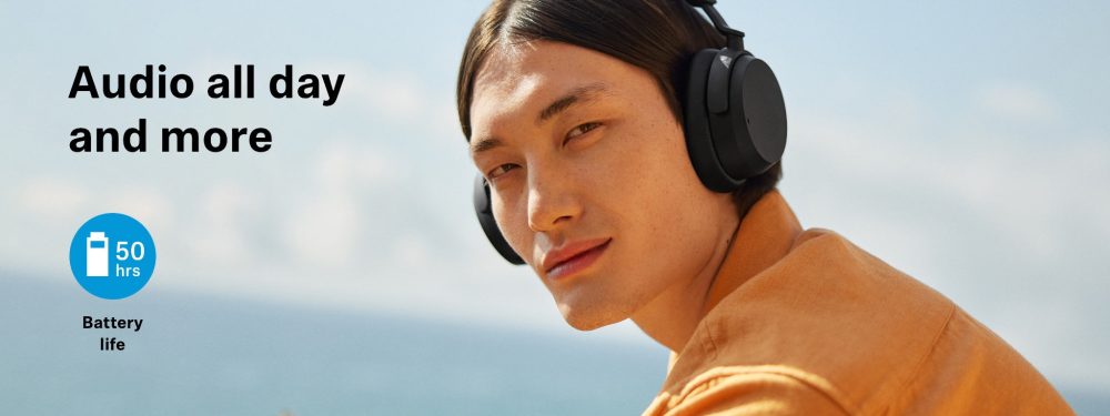 Banner highlighting battery life with human male wearing black Sennheiser Accentum